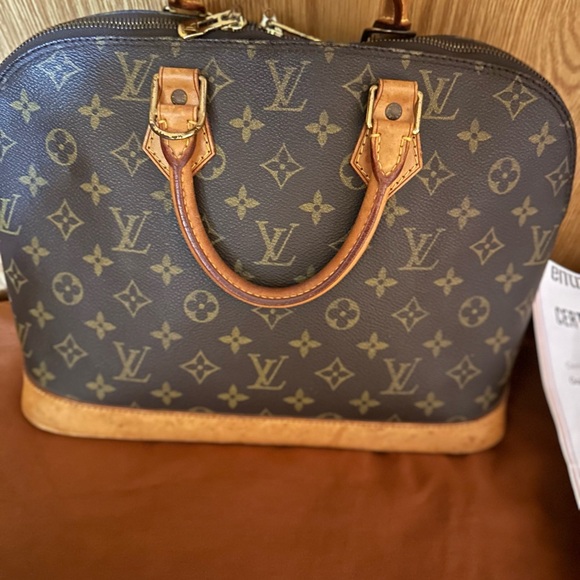 Louis Vuitton Handbags - Louis Vuitton Alma hand bag in great preloved condition. This is an awesome